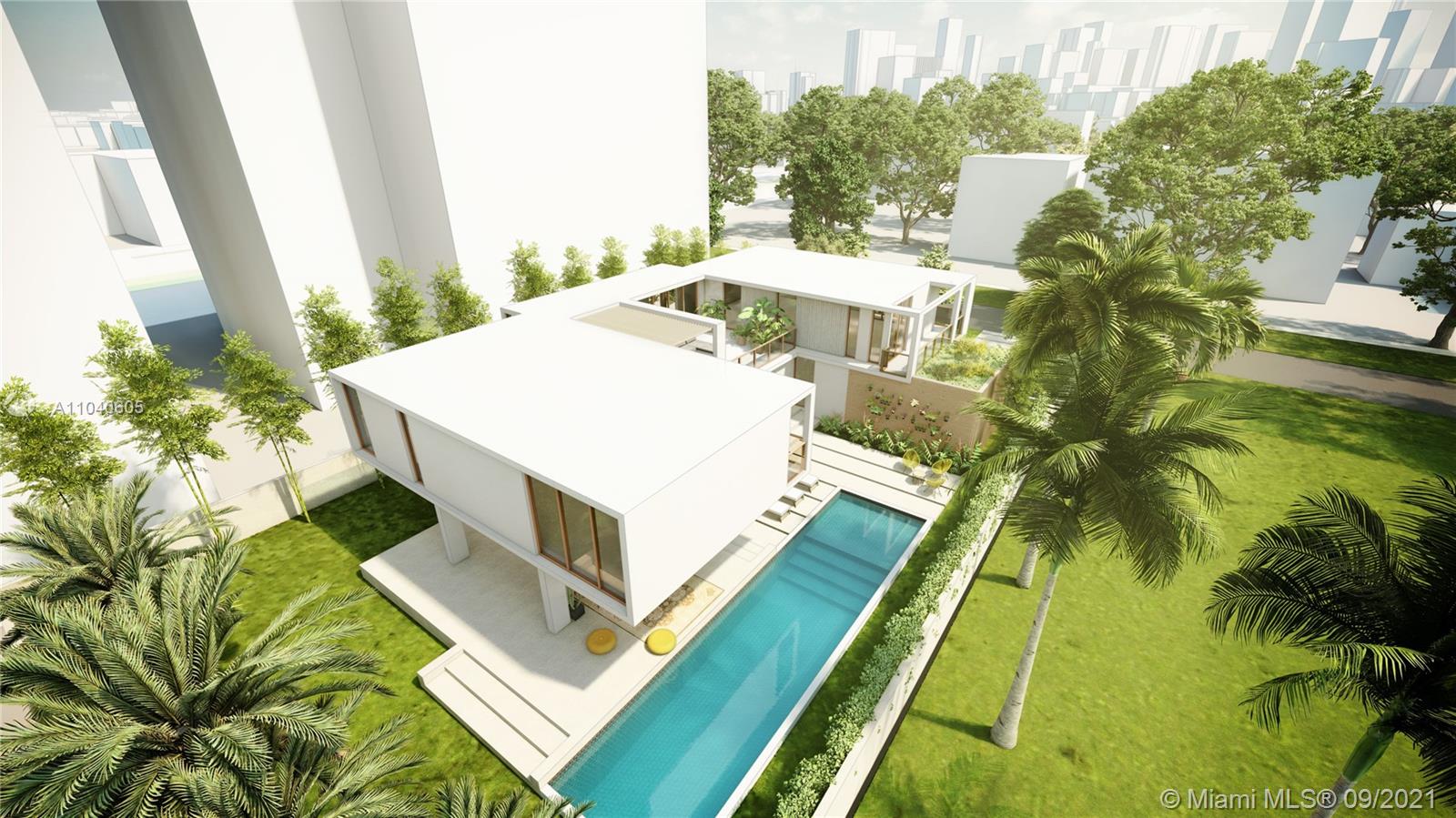 252 Southwest 20th Road Miami, FL 33129 - Photo 4 of 8 a view of a swimming pool with an outdoor seating area