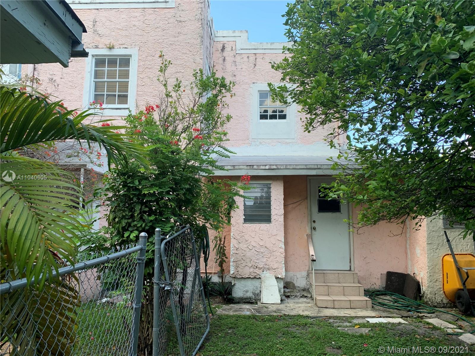 252 Southwest 20th Road Miami, FL 33129 - Photo 8 of 8 a front view of a house with a garden and plants