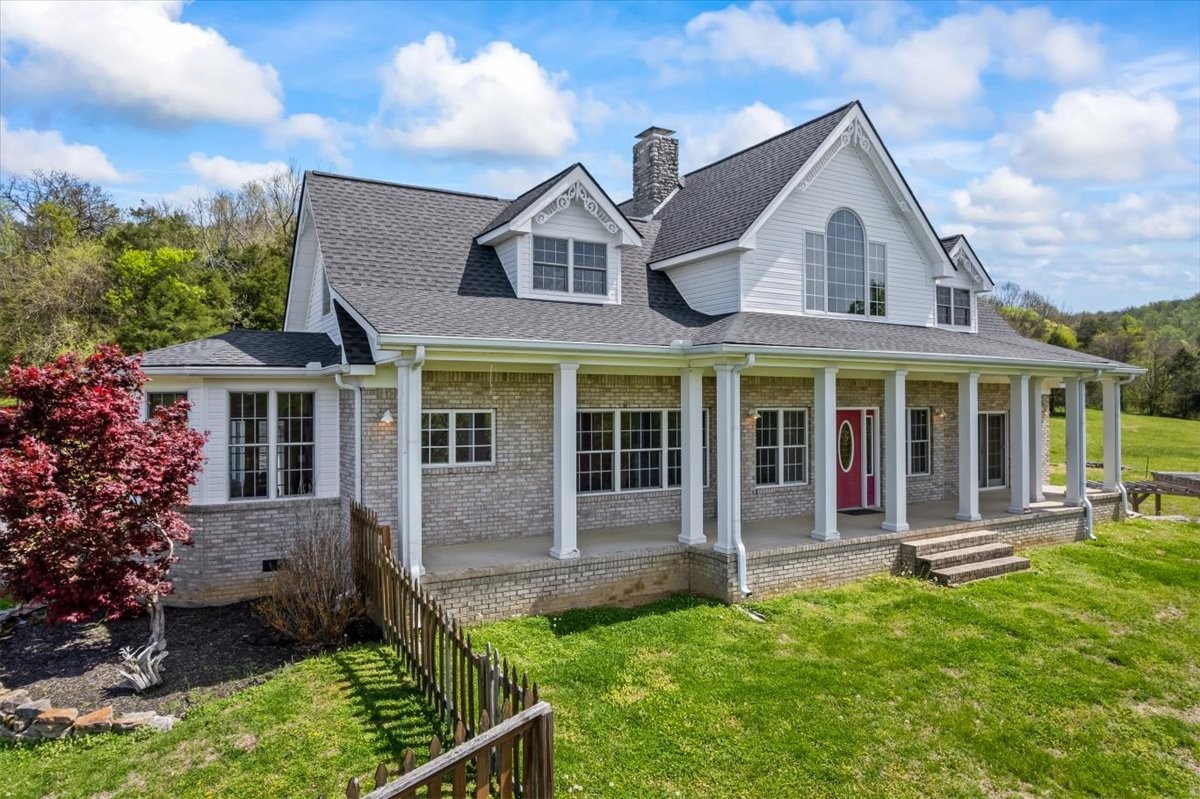 216 Old Wolf Hill Road Bethpage, TN 37022 - Photo 3 of 70 front view of a house with a yard