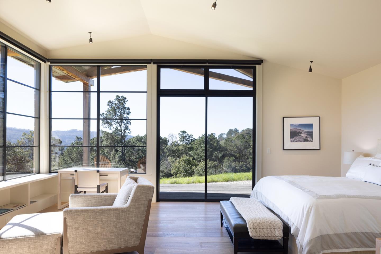 11 Alta Madera Carmel, CA 93923 - Photo 11 of 24 a bedroom with furniture and a large window