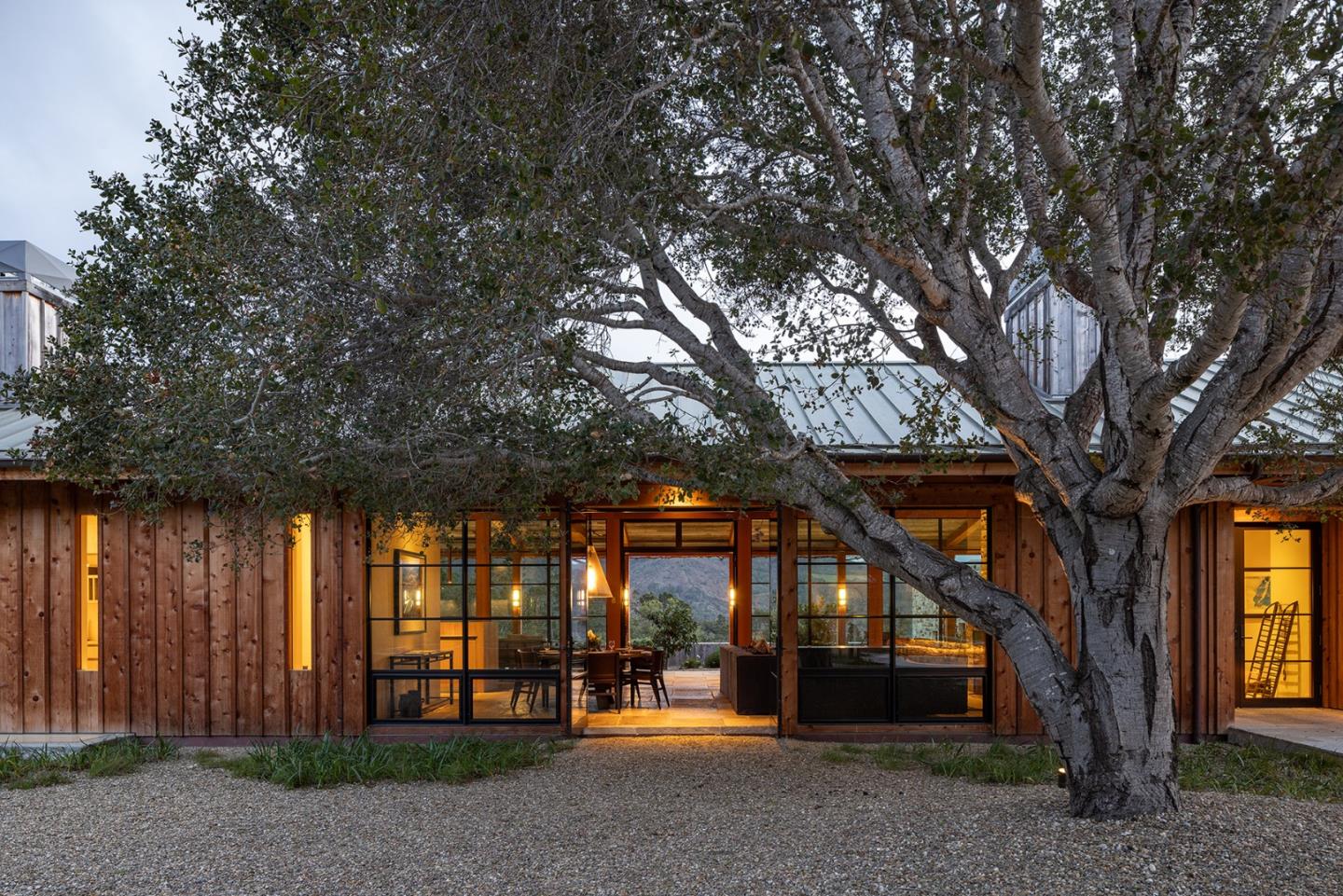 11 Alta Madera Carmel, CA 93923 - Photo 21 of 24 a front view of a house with a tree