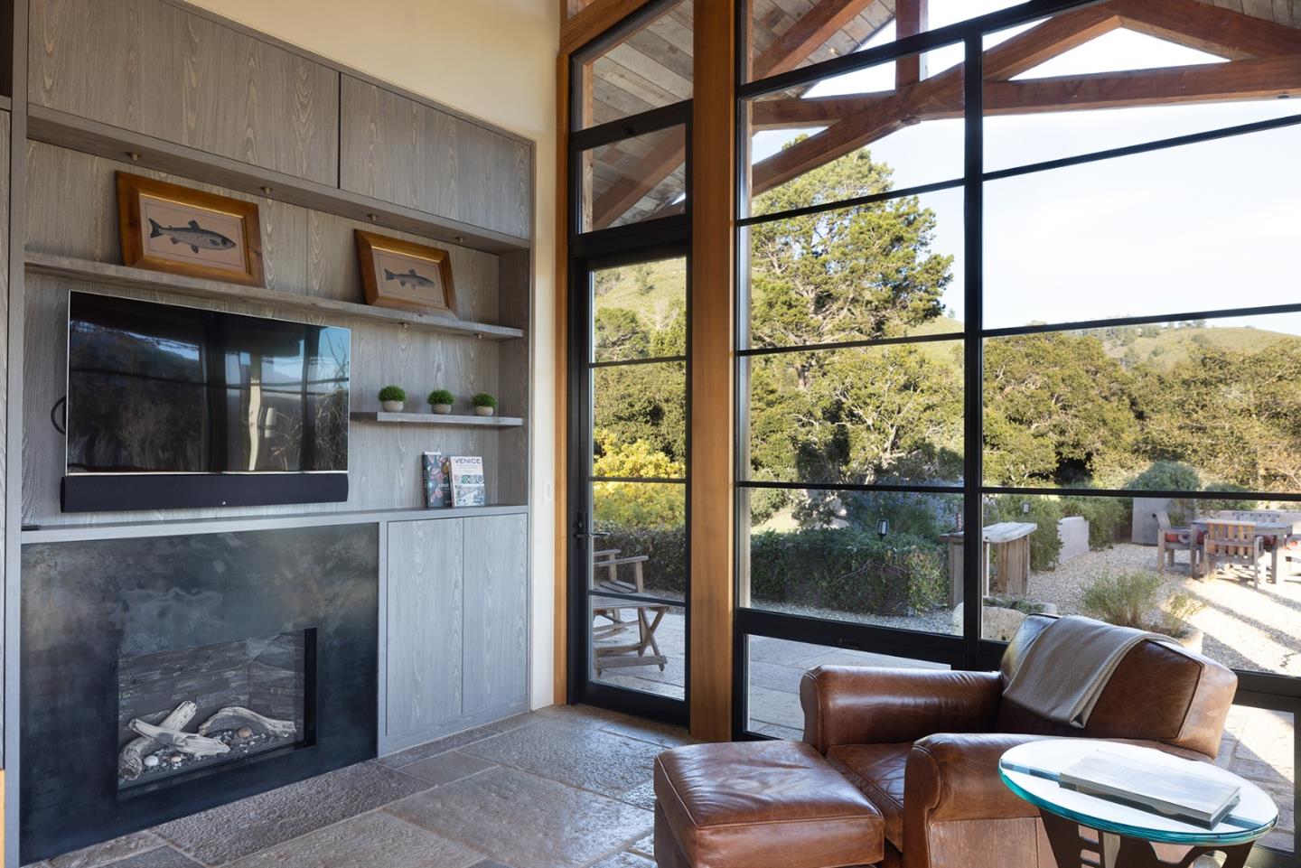 11 Alta Madera Carmel, CA 93923 - Photo 8 of 24 a living room with furniture and a floor to ceiling window