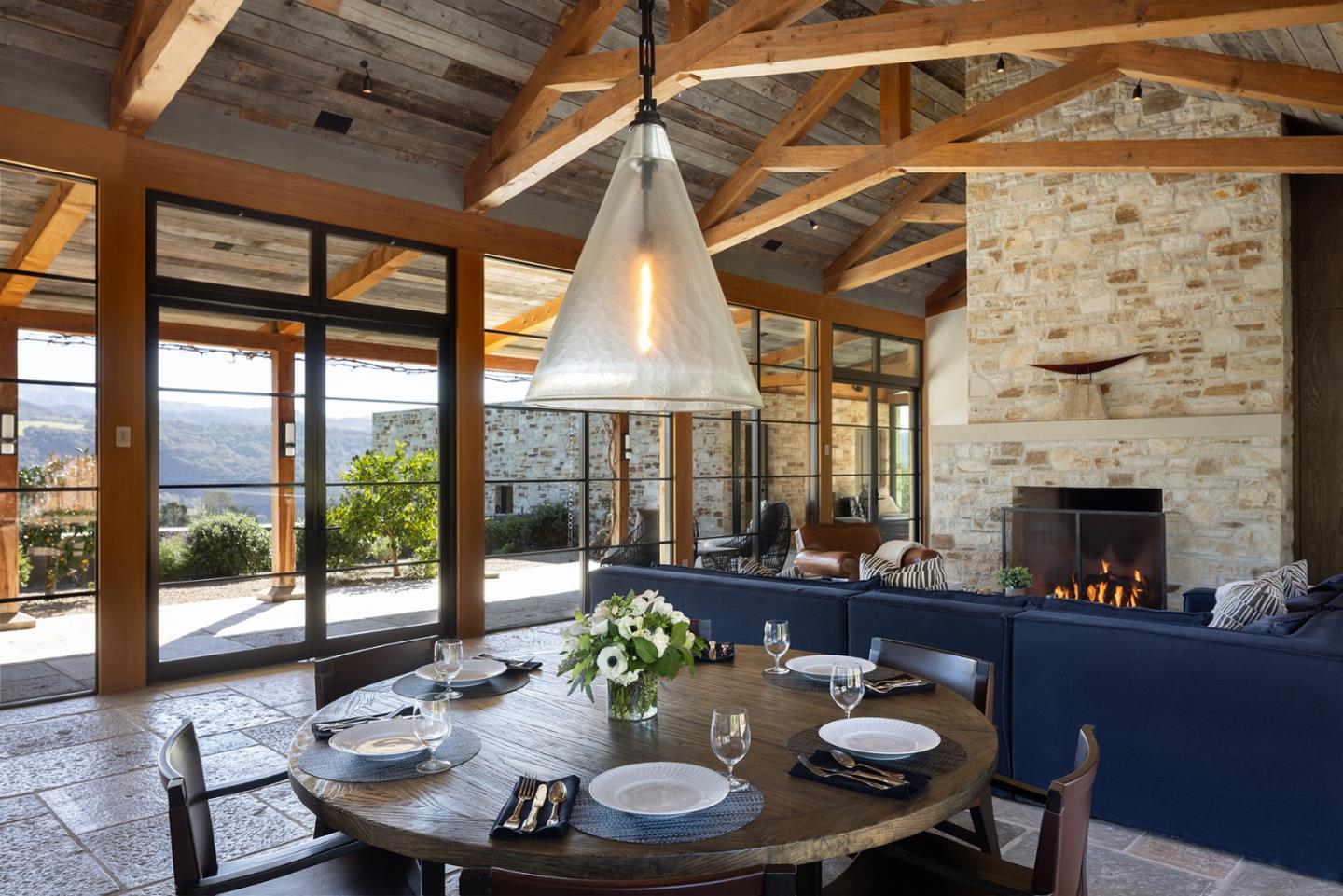11 Alta Madera Carmel, CA 93923 - Photo 9 of 24 a dining room with furniture a fireplace and wooden floor