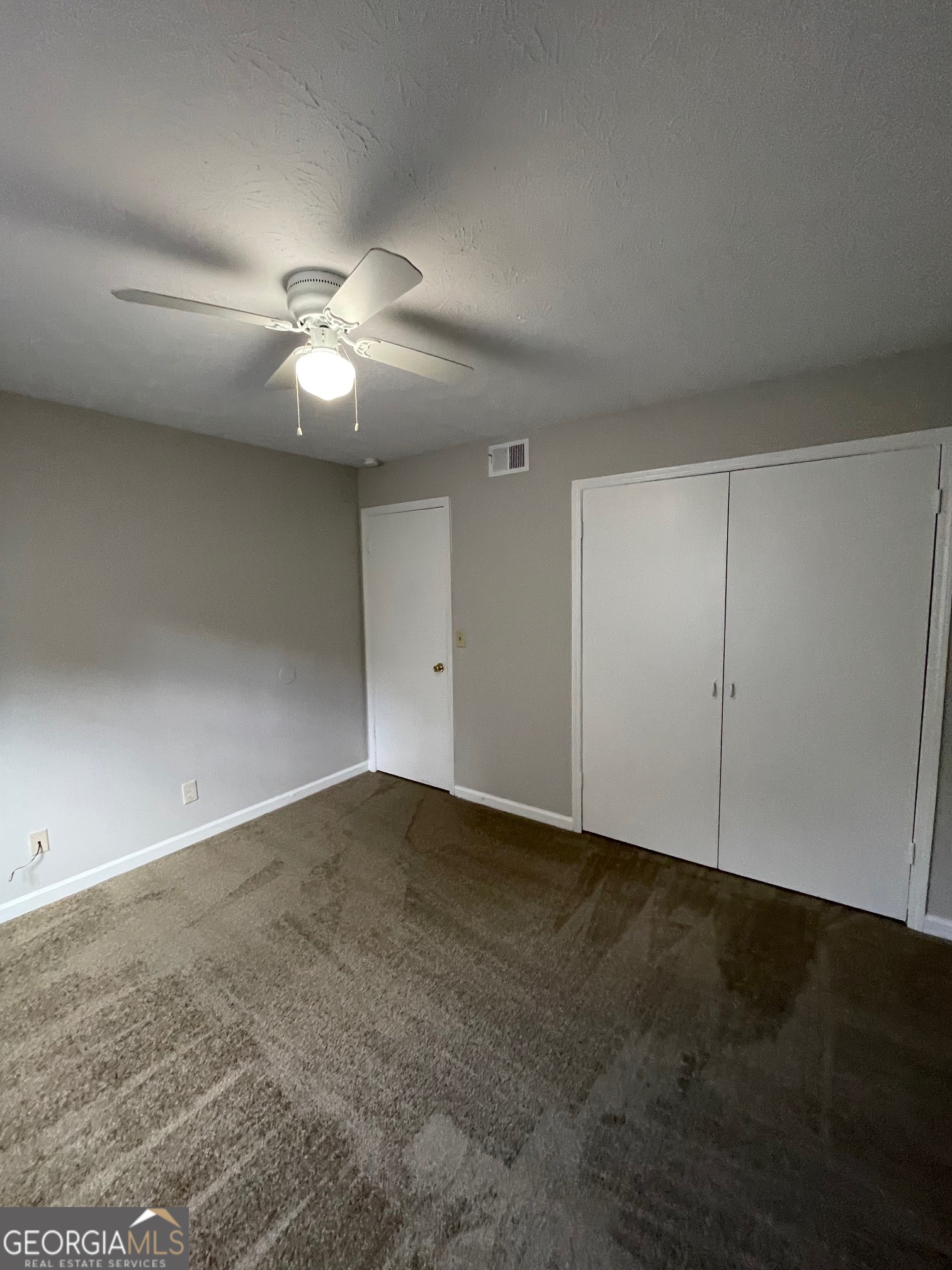 155 Bowen Street, Unit 9 Carrollton, GA 30117 - Photo 17 of 25 a view of an empty room
