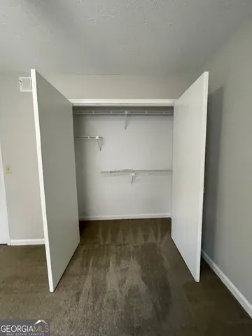 an empty room with closet