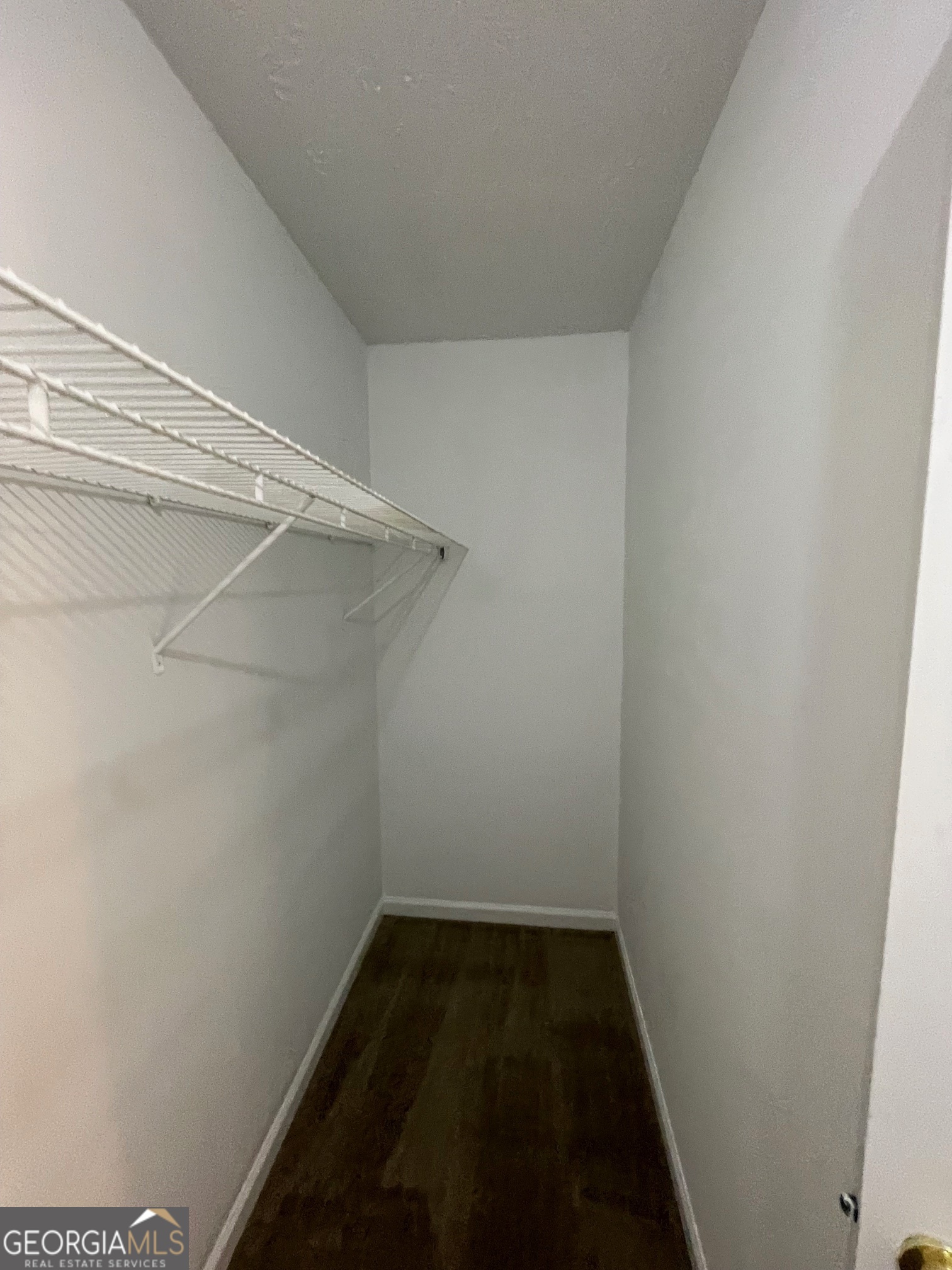 155 Bowen Street, Unit 9 Carrollton, GA 30117 - Photo 23 of 25 a empty walk in closet