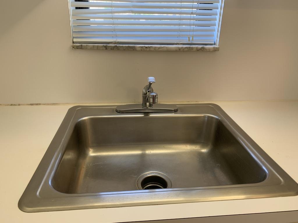 9370 Southwest 8th Street, Unit 202 Boca Raton, FL 33428 - Photo 11 of 46 a close view of sink