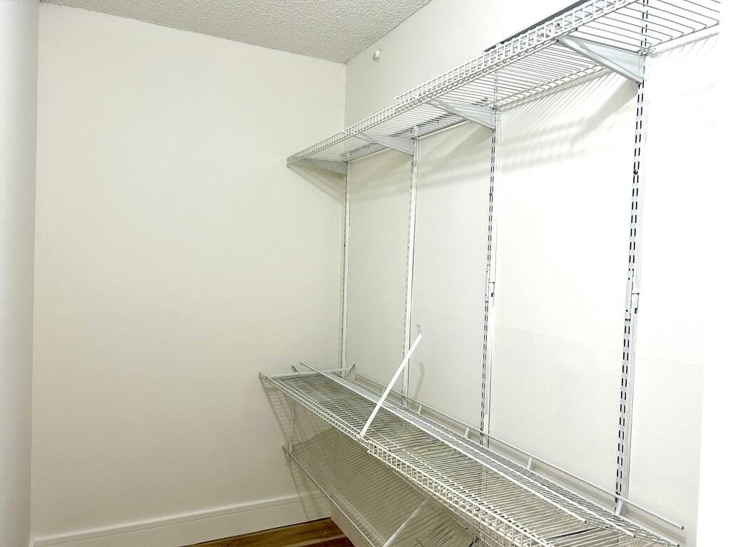 9370 Southwest 8th Street, Unit 202 Boca Raton, FL 33428 - Photo 21 of 46 a room with a shower and a window