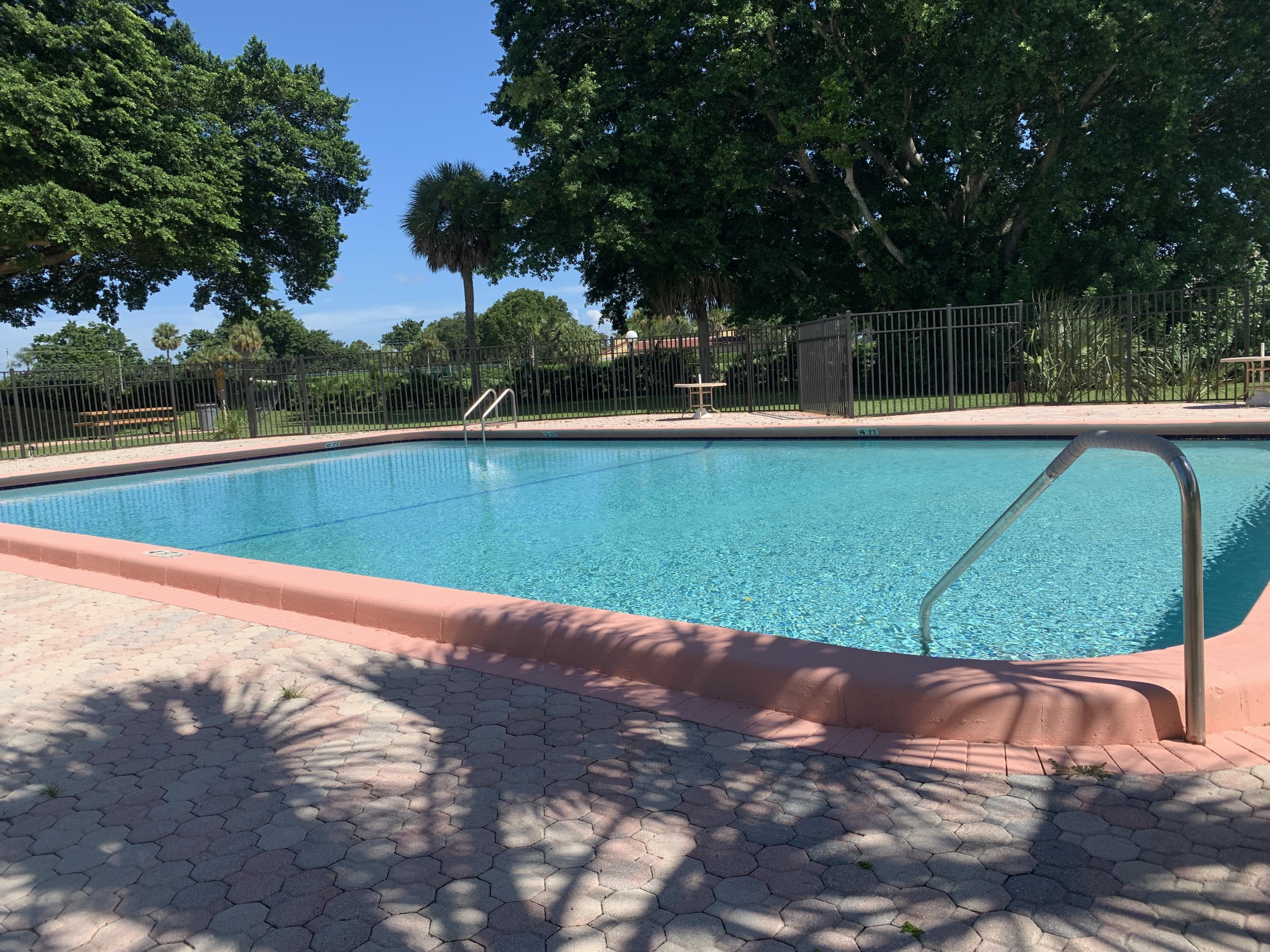 9370 Southwest 8th Street, Unit 202 Boca Raton, FL 33428 - Photo 33 of 46 a view of a back yard