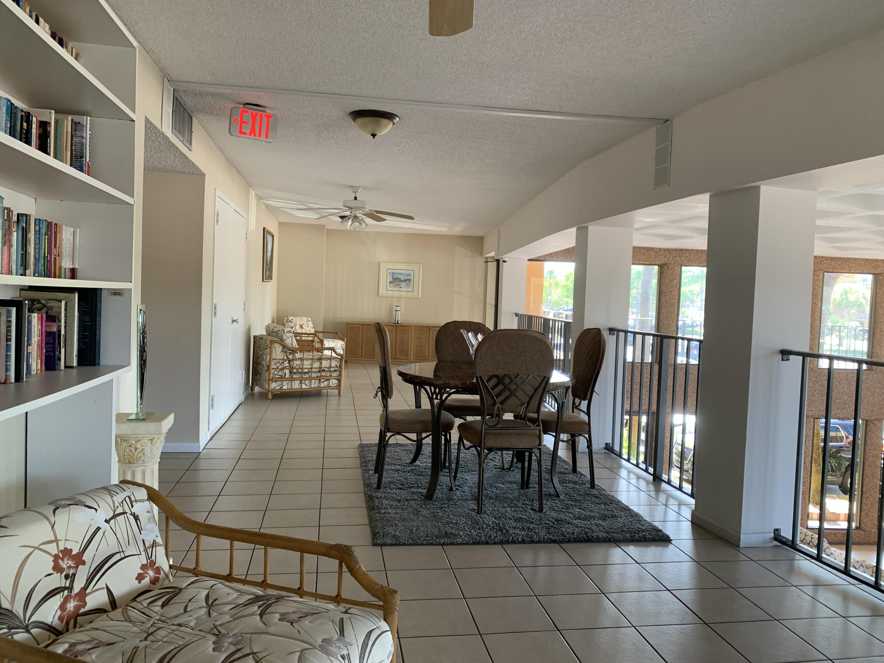 9370 Southwest 8th Street, Unit 202 Boca Raton, FL 33428 - Photo 38 of 46 a view of a dining room with furniture