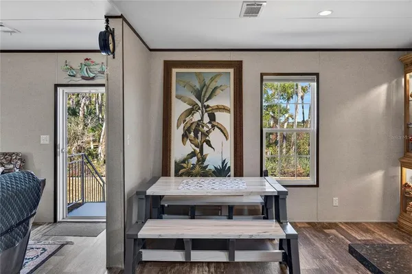 a view of a livingroom with furniture and window