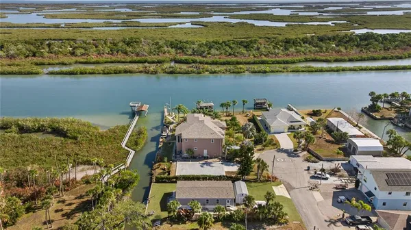 a view of a lake with a house