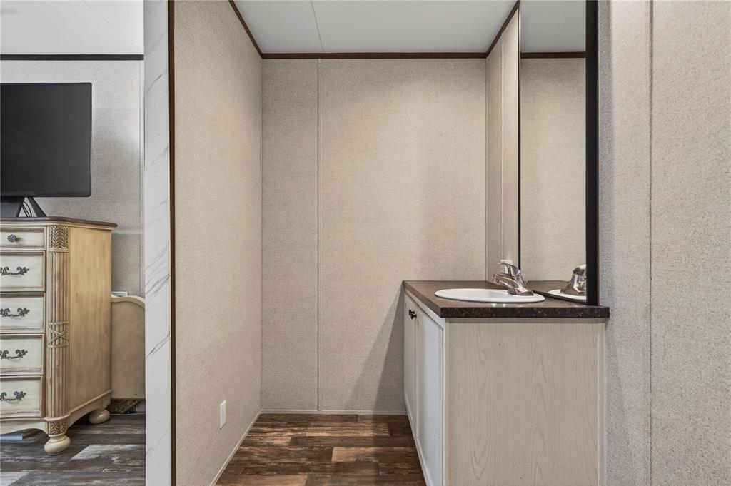 185 Coleman Street Edgewater, FL 32141 - Photo 26 of 47 a view of a hallway with workspace