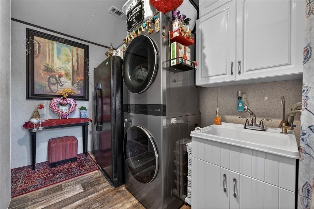 185 Coleman Street Edgewater, FL 32141 - Photo 35 of 47 a utility room with dryer and washer