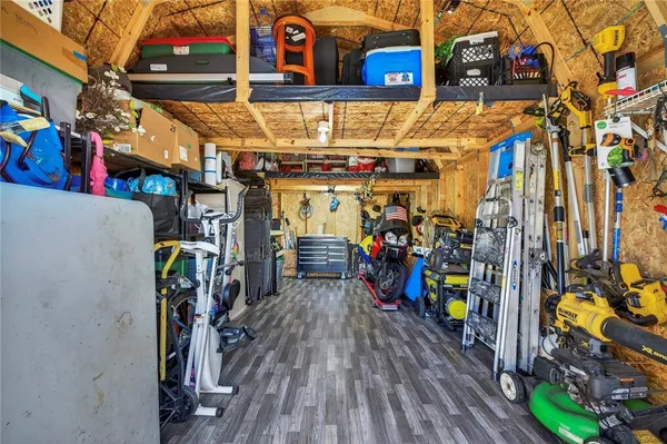 an aerial view of a house with a lake view