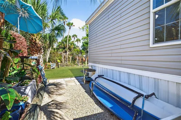 a view of a house with backyard