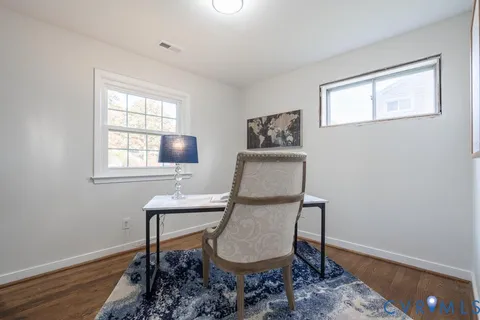a room with furniture and a window