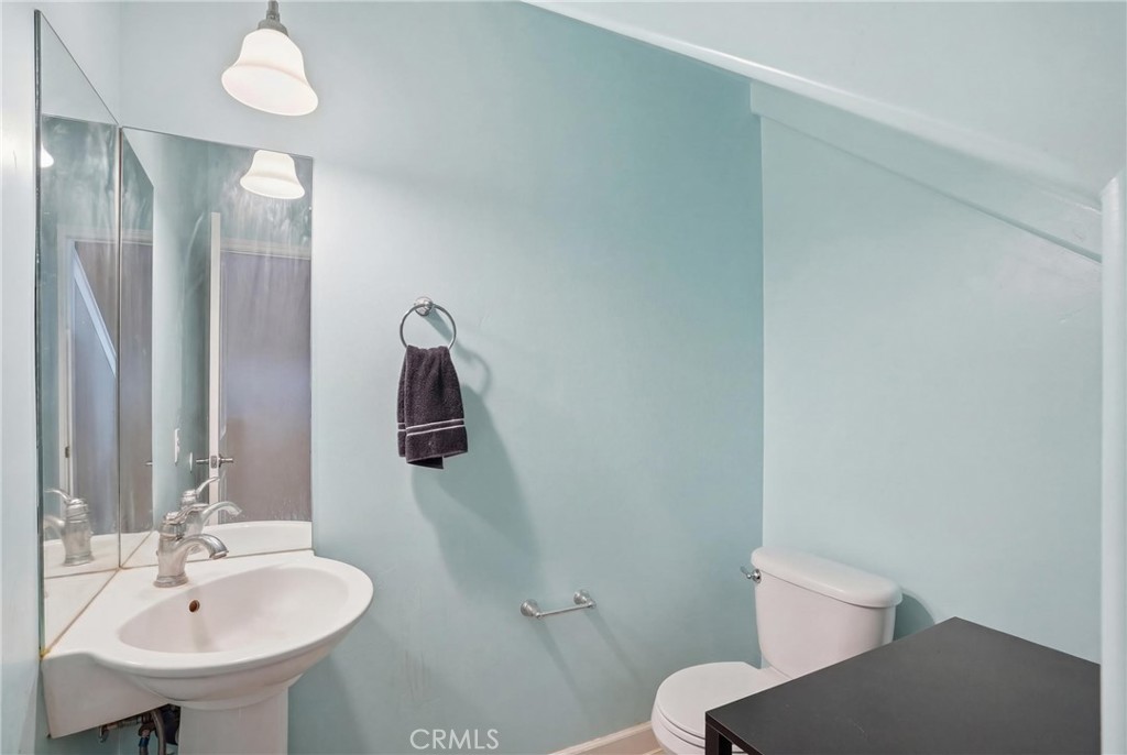 131 Watering Place Templeton, CA 93465 - Photo 14 of 27 a bathroom with a sink toilet and mirror