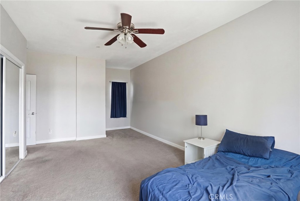 131 Watering Place Templeton, CA 93465 - Photo 18 of 27 a bedroom with bed and a ceiling fan