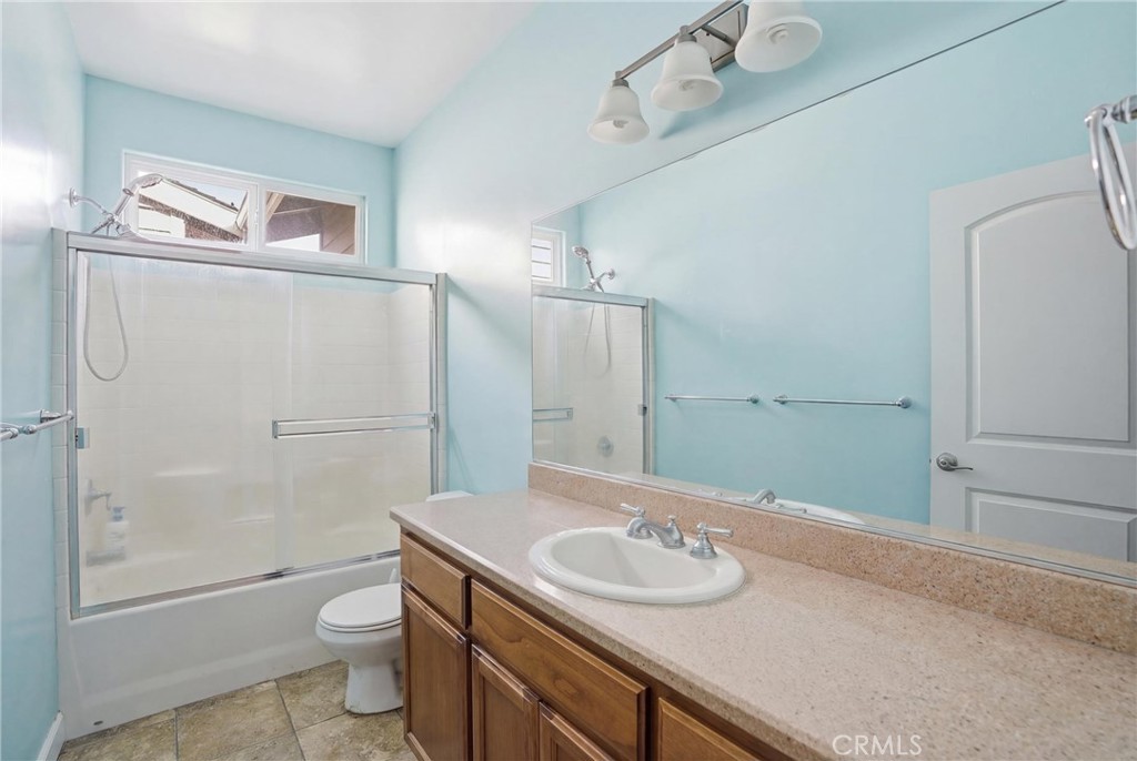 131 Watering Place Templeton, CA 93465 - Photo 22 of 27 a bathroom with a granite countertop sink toilet and shower