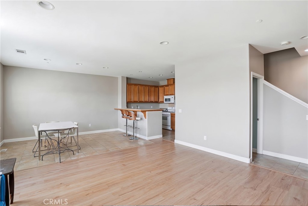 131 Watering Place Templeton, CA 93465 - Photo 3 of 27 a view of a kitchen with wooden floor and a workspace