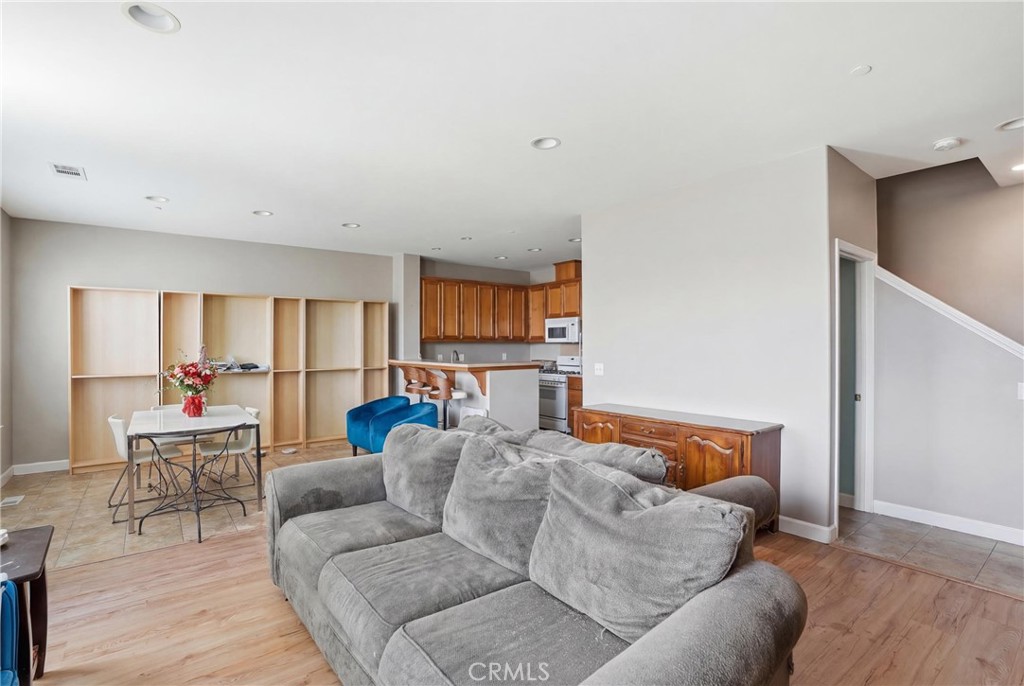 131 Watering Place Templeton, CA 93465 - Photo 4 of 27 a living room with furniture and a wooden floor
