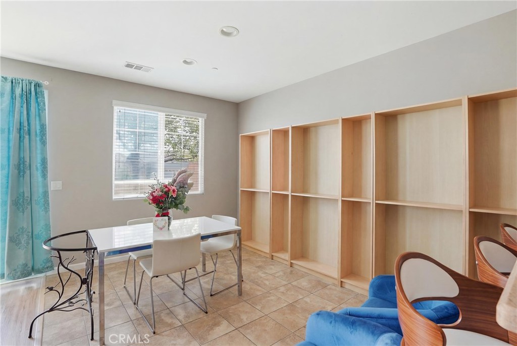 131 Watering Place Templeton, CA 93465 - Photo 10 of 27 a view of a dining room with furniture window and wooden floor