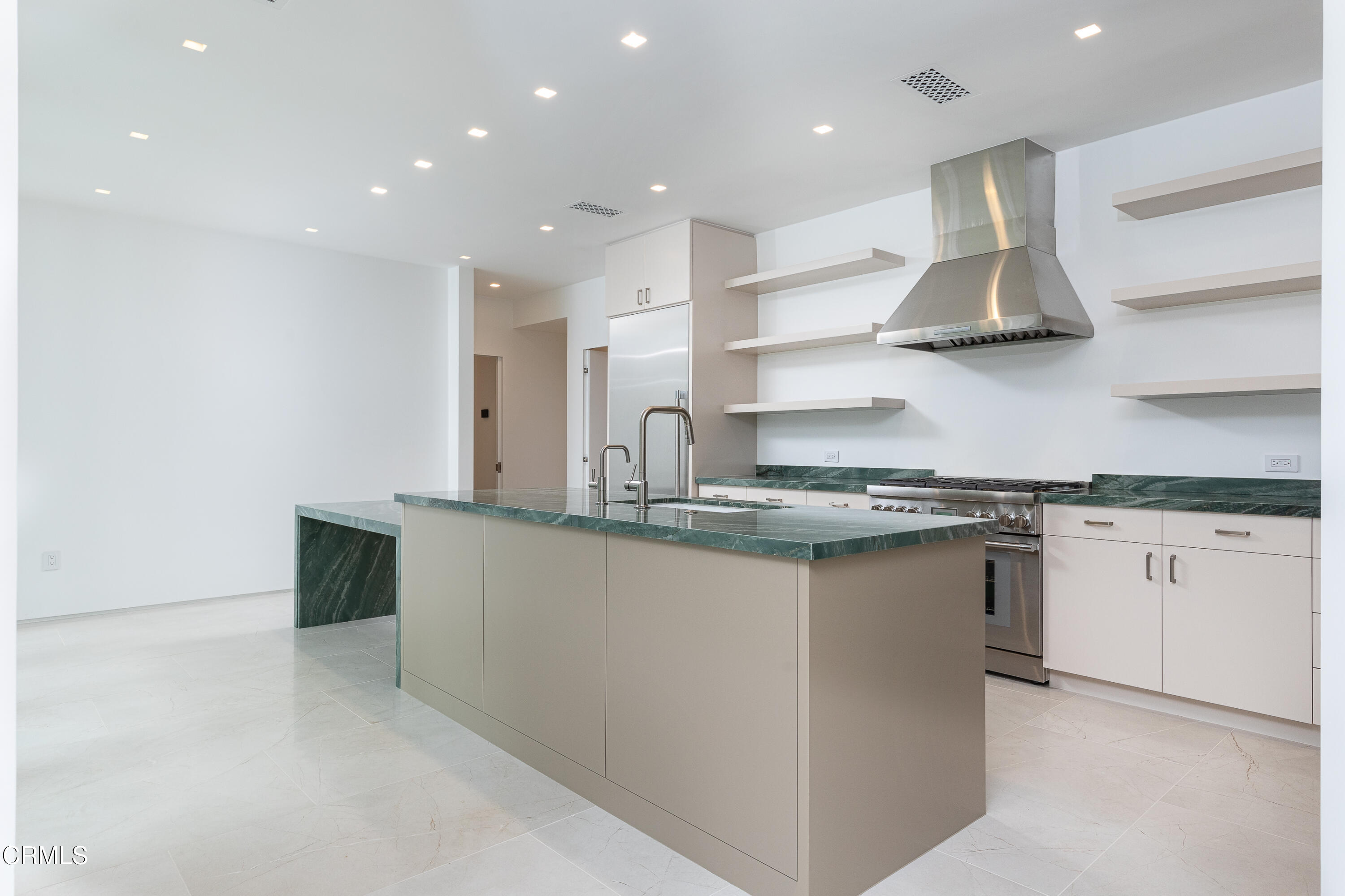 800 Canon Drive Pasadena, CA 91106 - Photo 17 of 49 a kitchen with stainless steel appliances granite countertop a sink and a stove