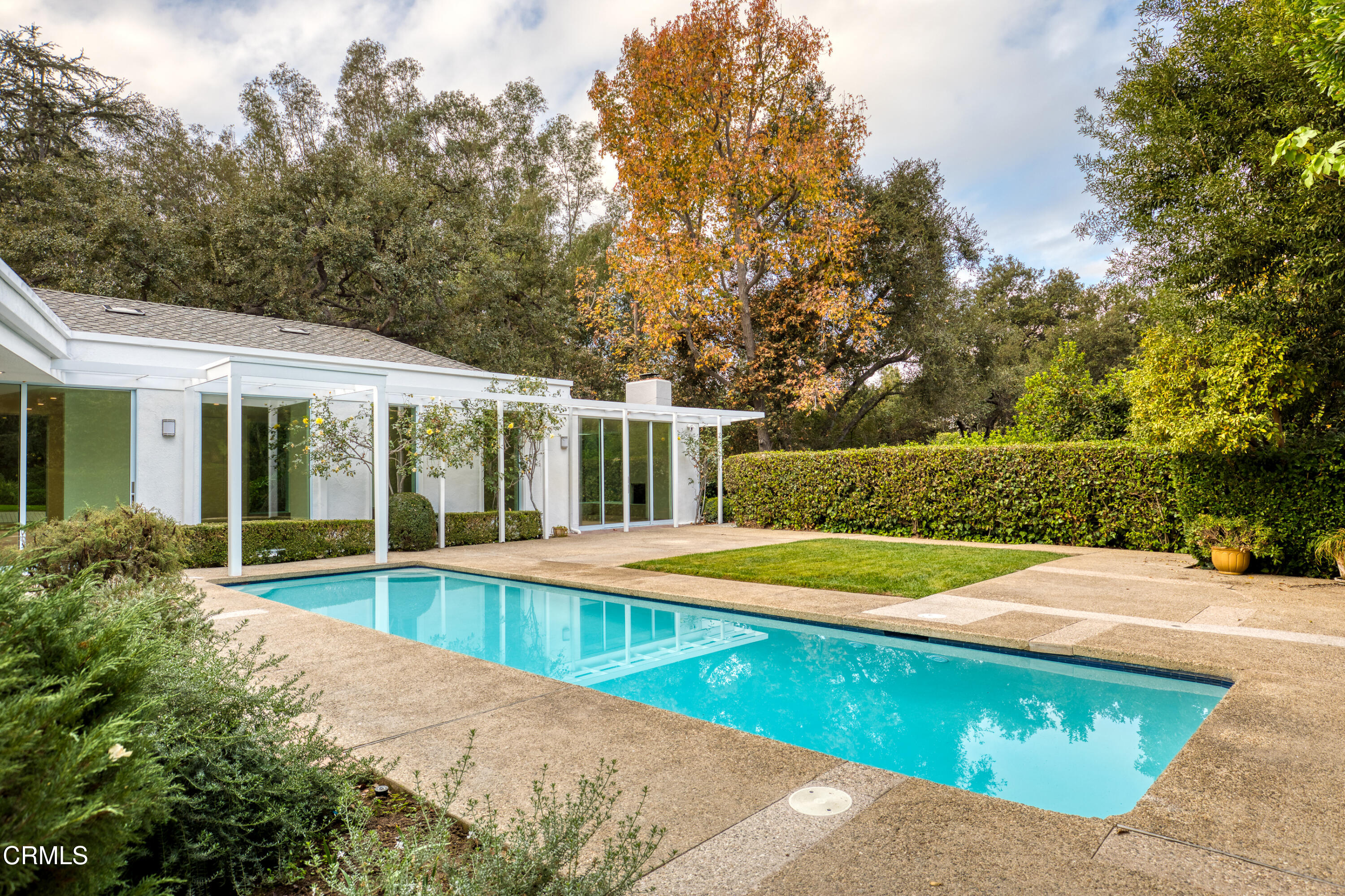 800 Canon Drive Pasadena, CA 91106 - Photo 2 of 49 a view of a house with pool and chairs