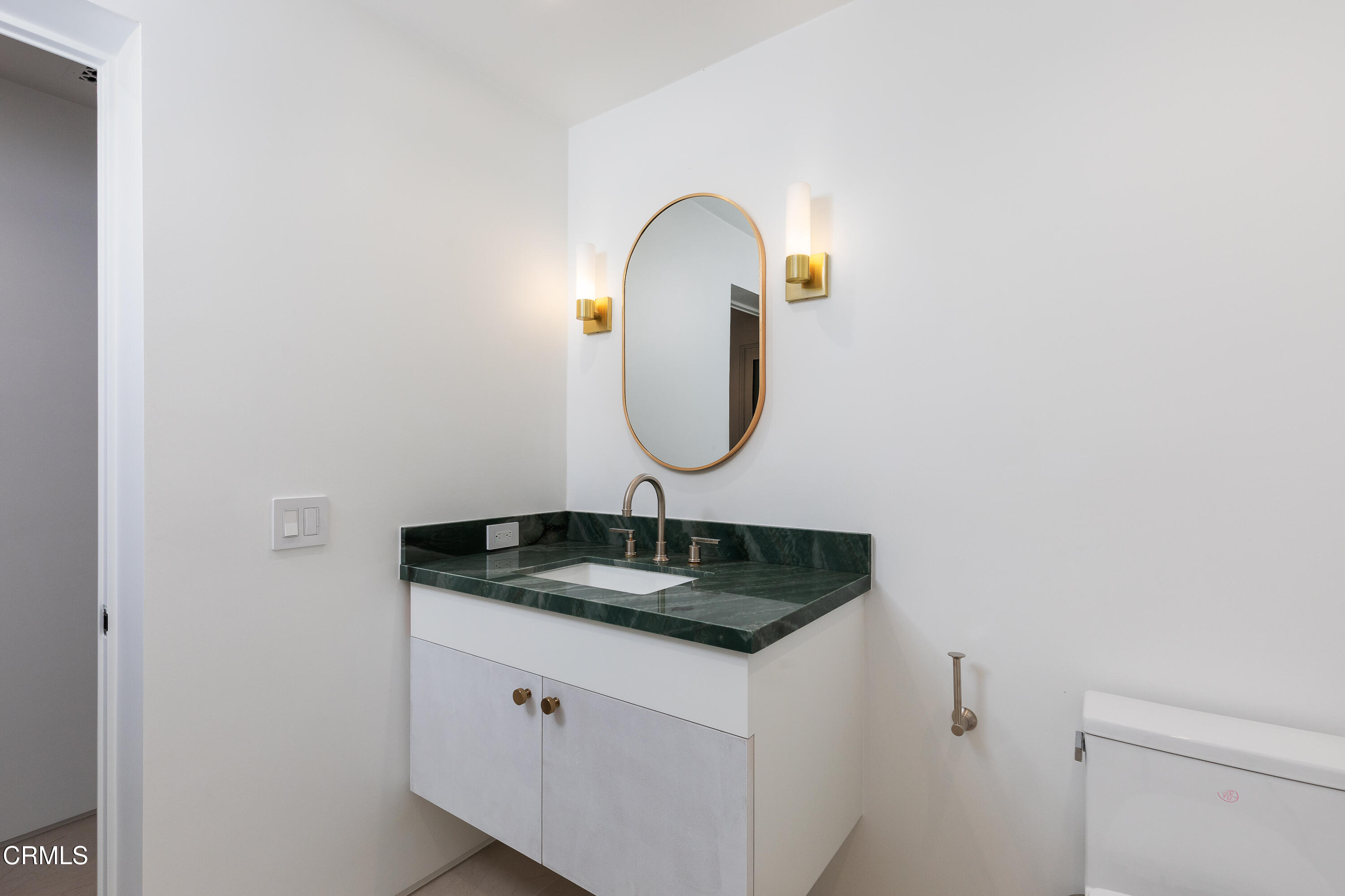 800 Canon Drive Pasadena, CA 91106 - Photo 27 of 49 a close view of a sink and a vanity in a bathroom