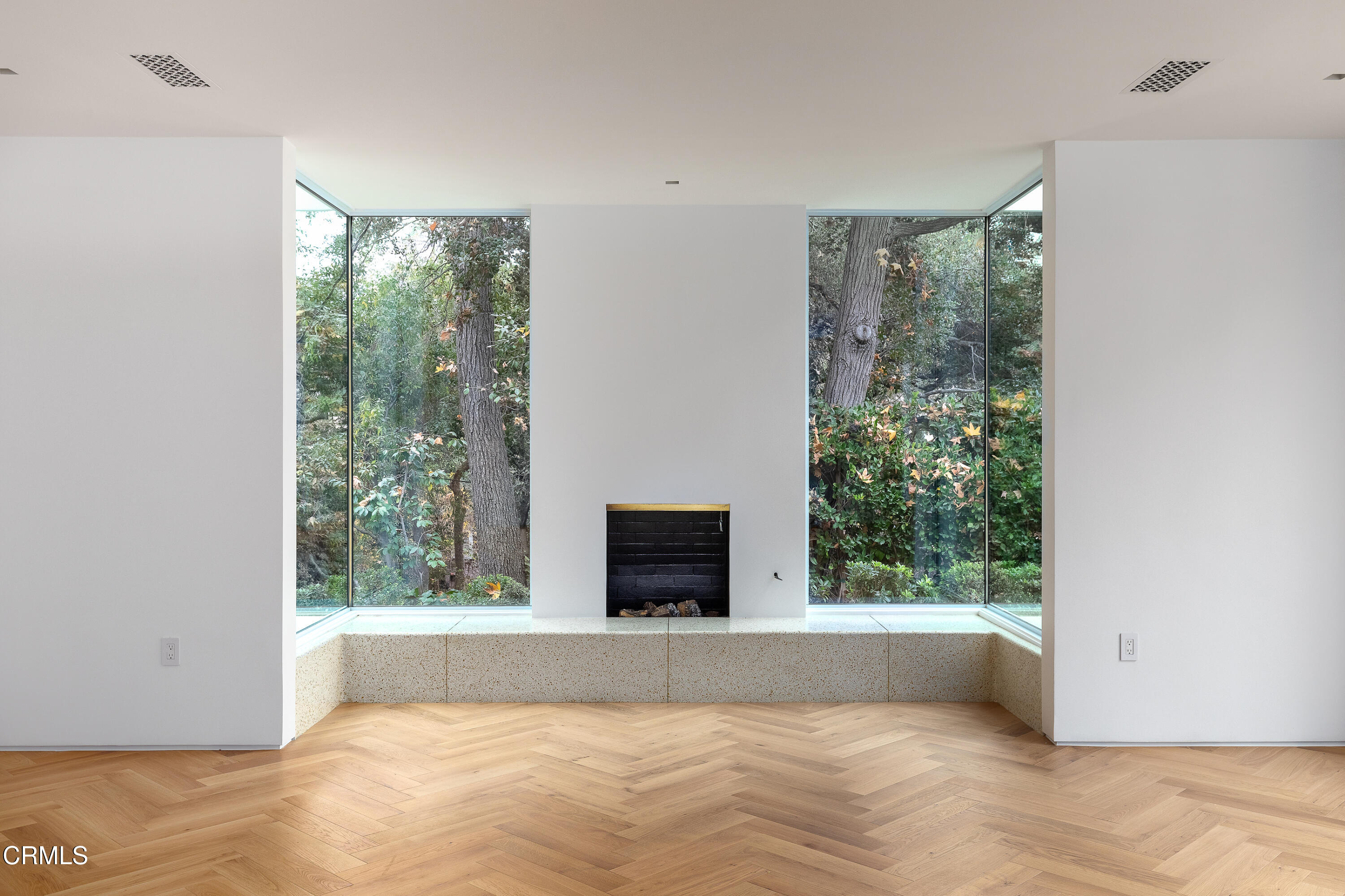800 Canon Drive Pasadena, CA 91106 - Photo 7 of 49 a view of an empty room with wooden floor and a window