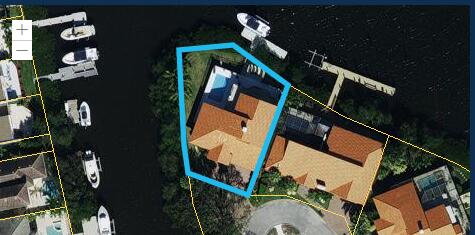 an aerial view of a house swimming pool and outdoor space