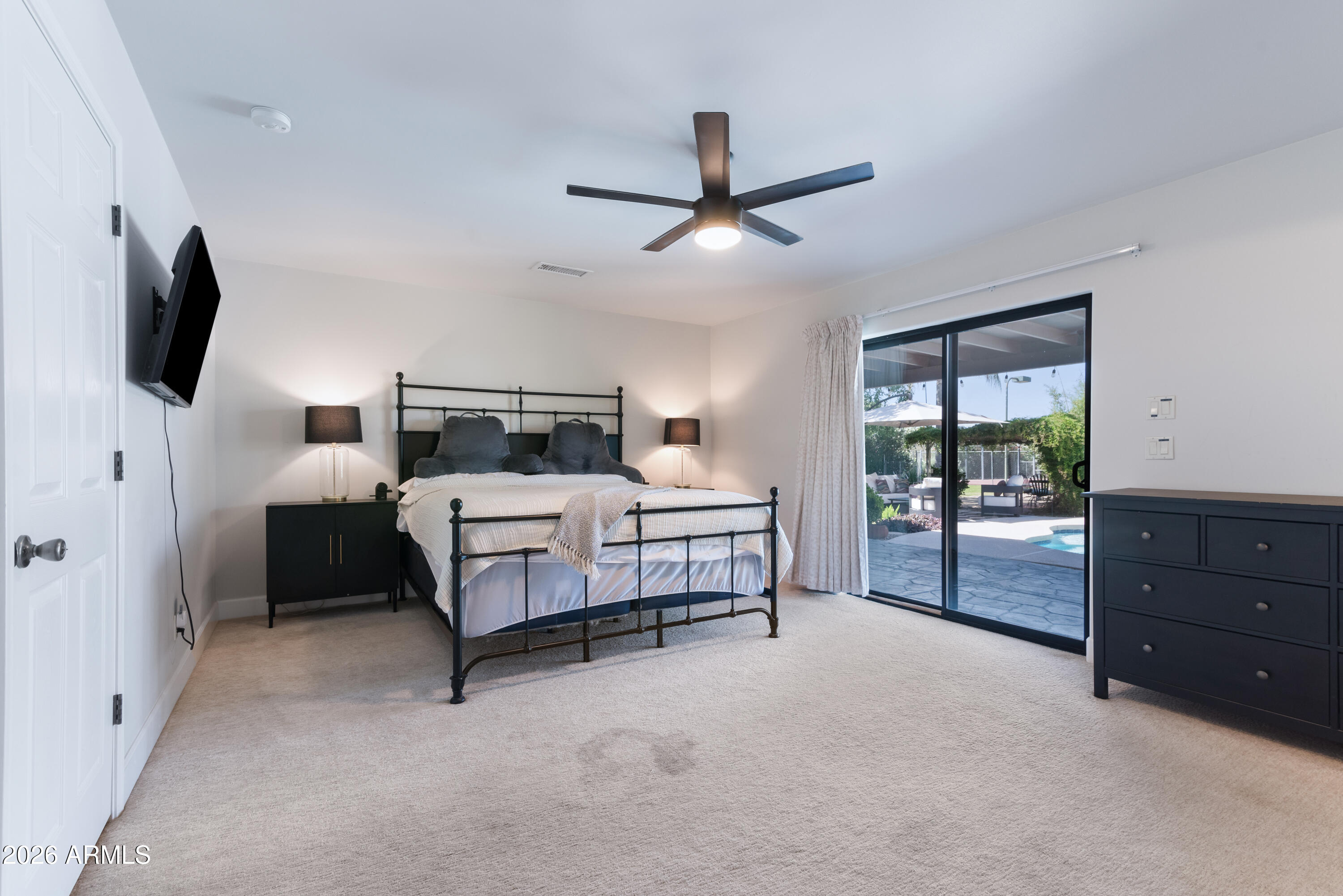19216 North 29th Street Phoenix, AZ 85050 - Photo 11 of 42 Primary Bedroom w/ Backyard Access