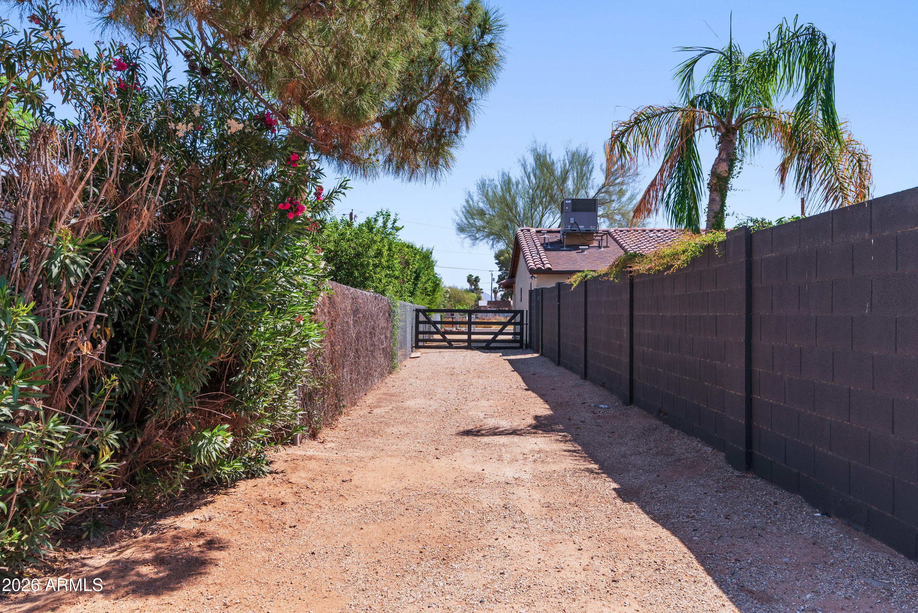 19216 North 29th Street Phoenix, AZ 85050 - Photo 29 of 42 RV Gate Access to Rear of Lot
