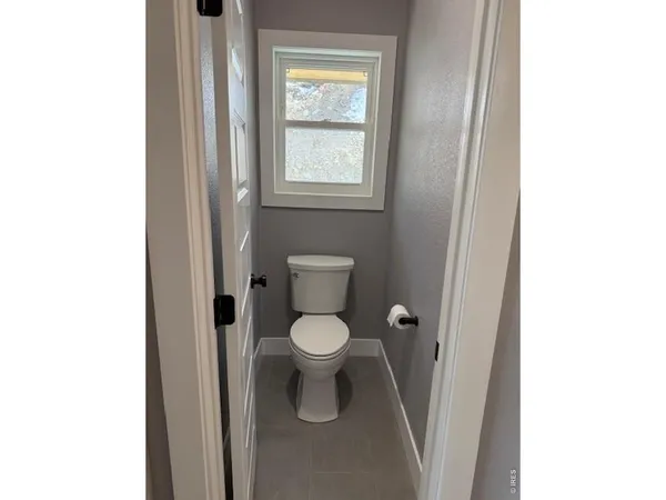 a en suite bathroom with a sink and mirror