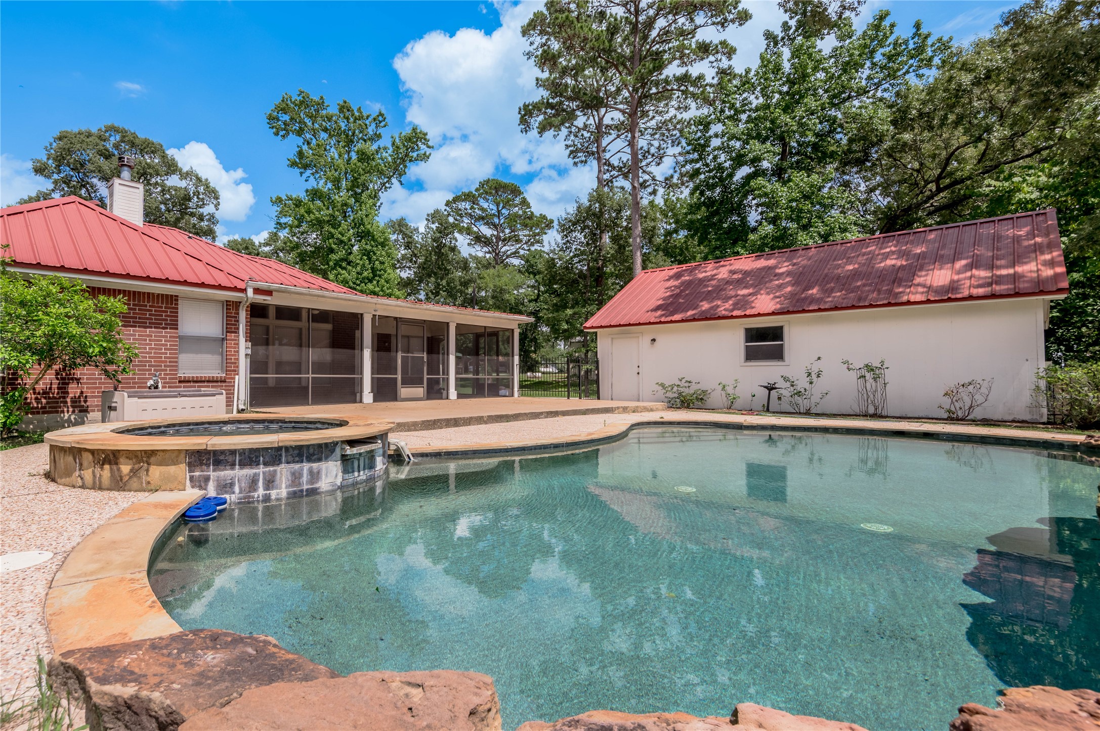 324 Red Oak Lane Trinity, TX 75862 - Photo 7 of 49 a house with swimming pool in front of it