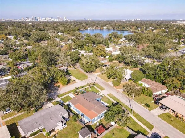 an aerial view of residential houses with outdoor space