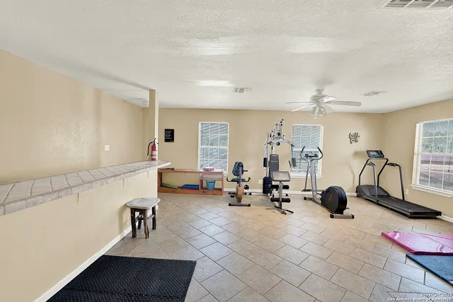 a view of a room with gym equipment