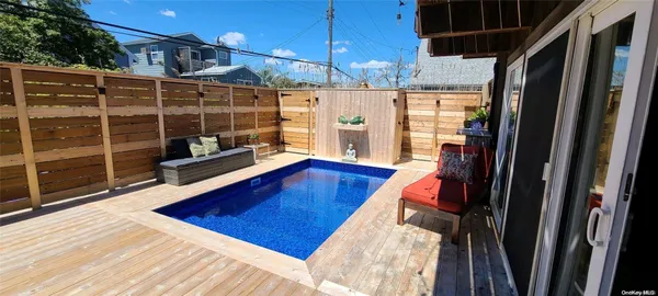 a view of a living room with a balcony