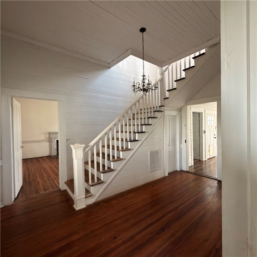 1014 Levis Smith Road Pendleton, SC 29670 - Photo 20 of 21 This spacious foyer features hardwood flooring and a grand staircase.