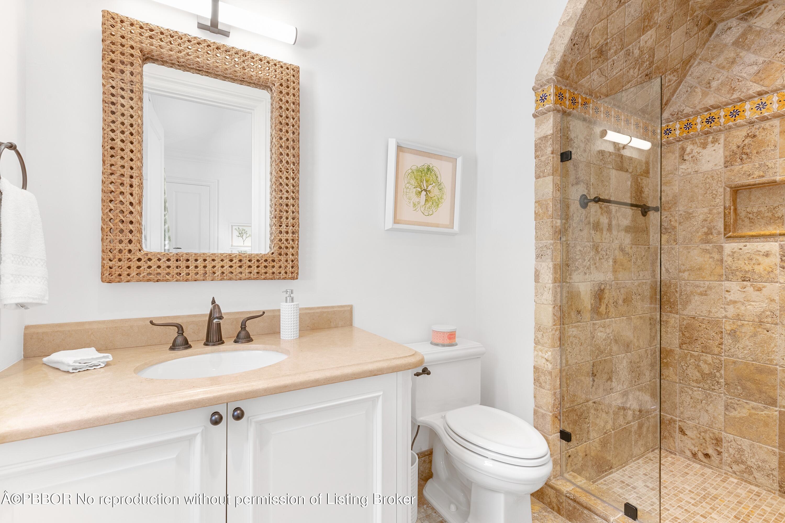 313 Dunbar Road Palm Beach, FL 33480 - Photo 38 of 73 a bathroom with a sink toilet and shower