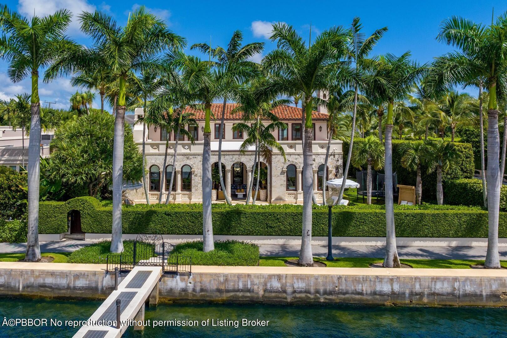 313 Dunbar Road Palm Beach, FL 33480 - Photo 5 of 73 a view of house with swimming pool and yard