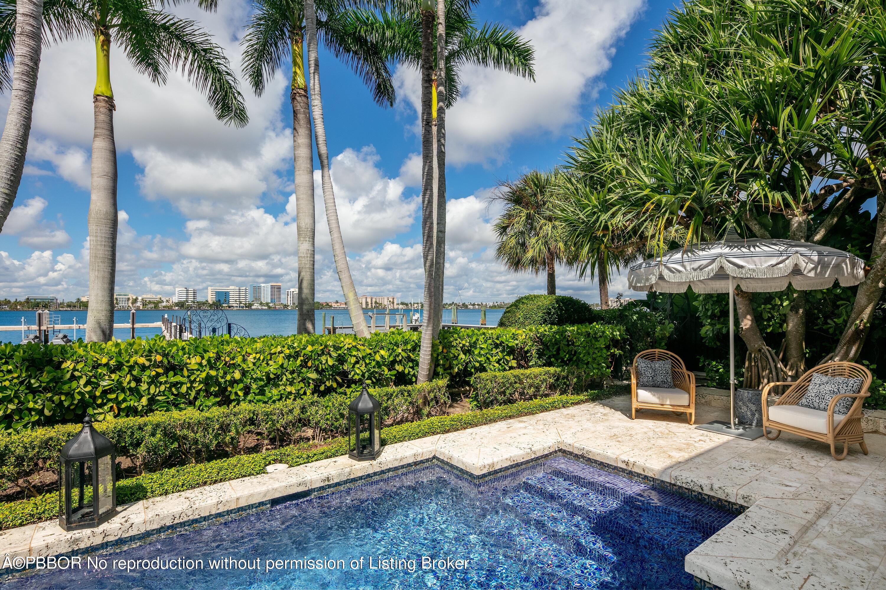 313 Dunbar Road Palm Beach, FL 33480 - Photo 57 of 73 a garden view with a seating space