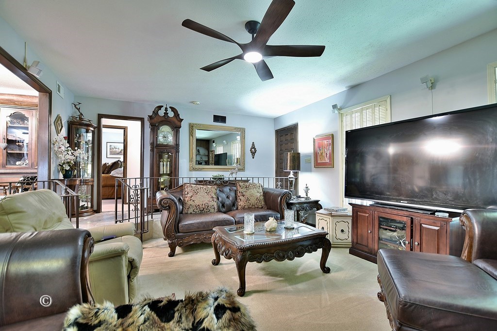 1237 Smith Road Fortson, GA 31808 - Photo 13 of 31 a living room with furniture and a flat screen tv