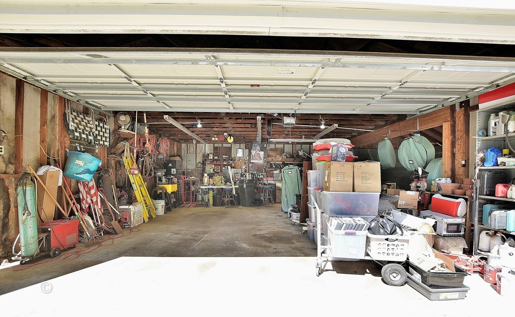 1237 Smith Road Fortson, GA 31808 - Photo 27 of 31 a view of a storage room with a lot of stuff