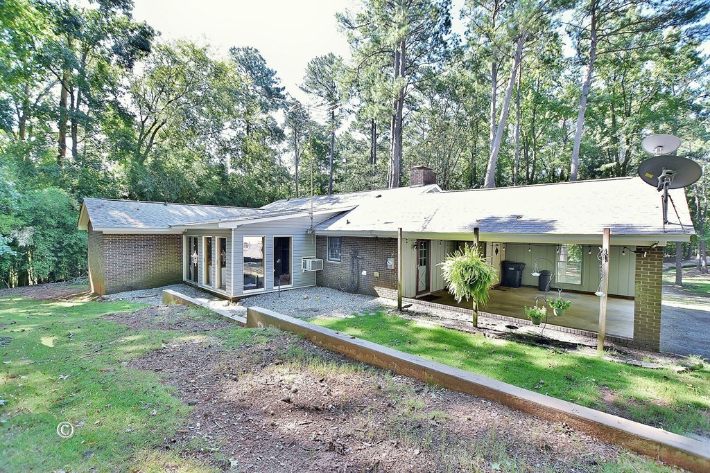 1237 Smith Road Fortson, GA 31808 - Photo 4 of 31 front view of a house with a yard
