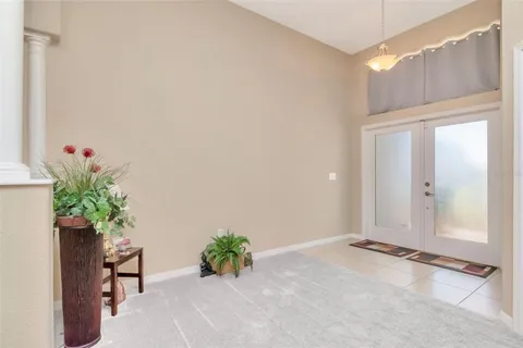 a bathroom with a sink tub shower and a mirror