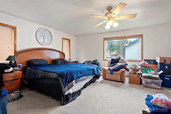 a bed room with a bed and a fish tank