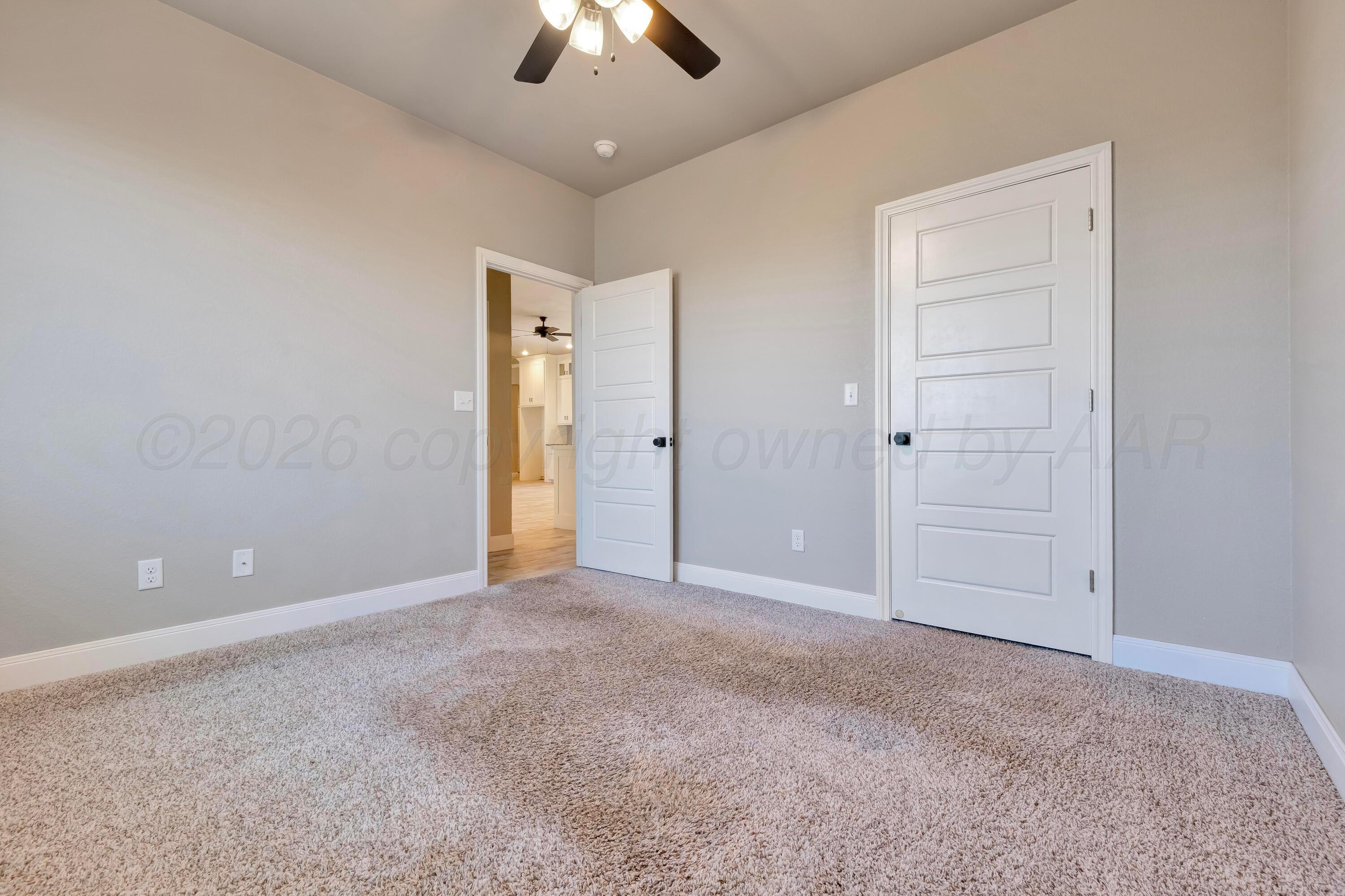 9295 Winecup Road Amarillo, TX 79119 - Photo 28 of 36 Bedroom 3 - 2