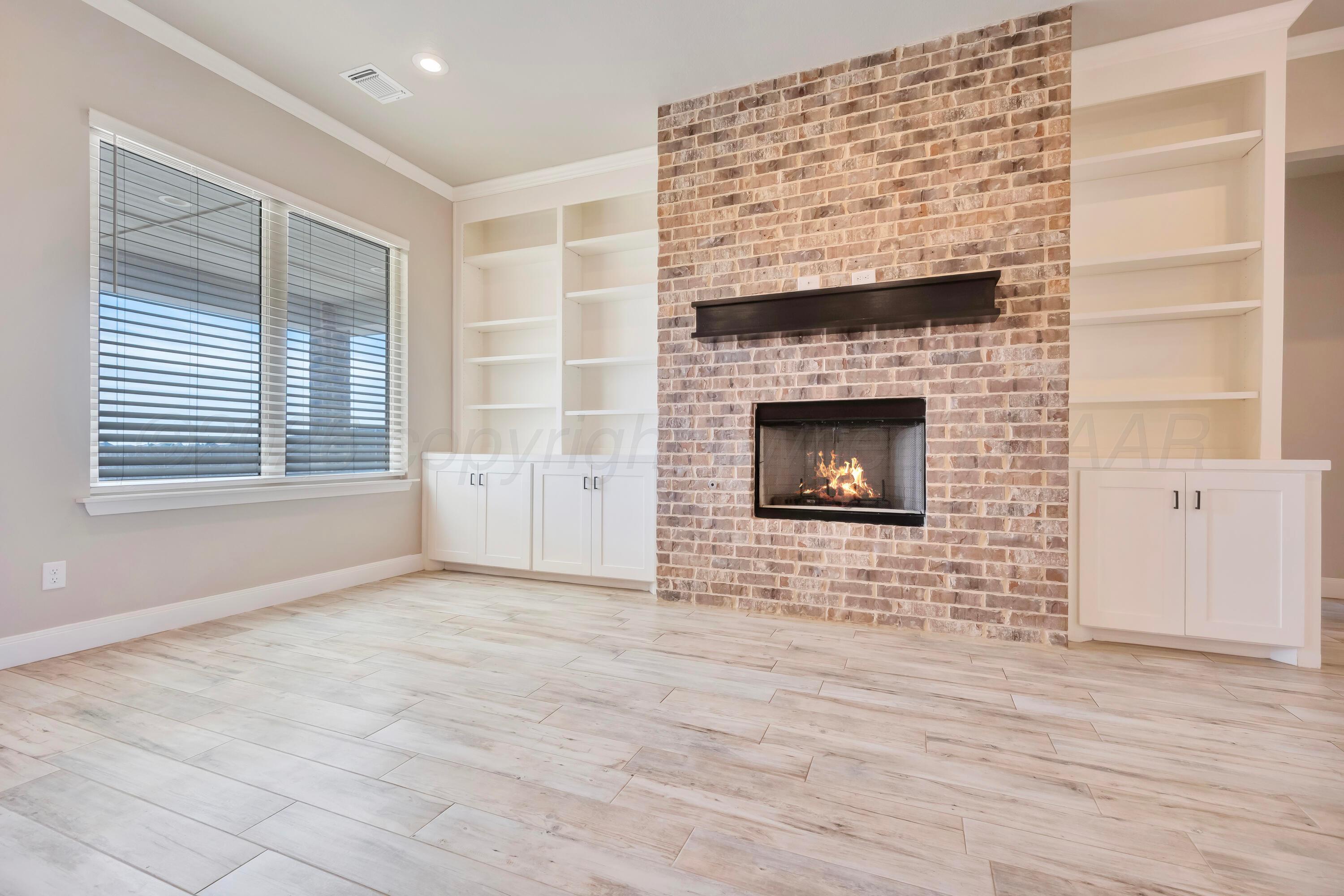 9295 Winecup Road Amarillo, TX 79119 - Photo 7 of 36 Living Room - 3